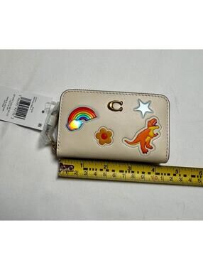 Coach Essential Small Zip Around Wallet Chalk Multi Dinosaur Rainbow Star Patch